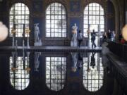 Tourists walk through the indoor Roman Pool at Hearst Castle on Aug. 1, 2018 in San Simeon, Calif.