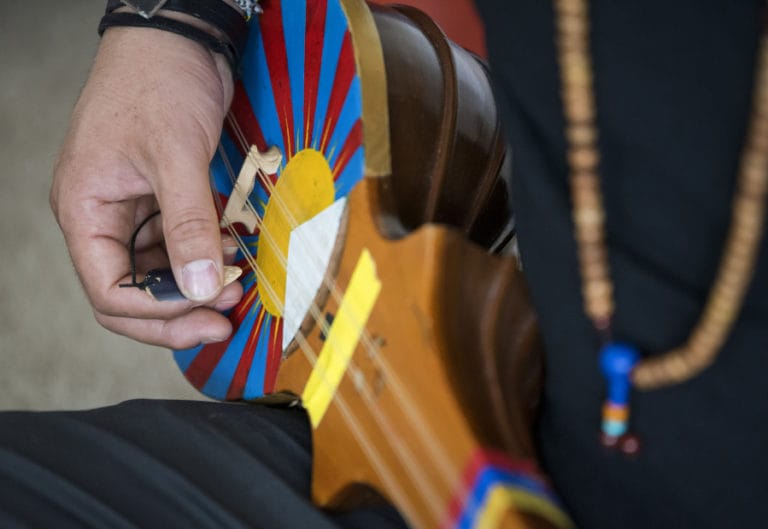 It’s not easy to procure a dramyen, or Tibetan mandolin. Tamding Tsetan’s favorite one includes a colorful Tibetan flag design.