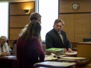 Attorney Shon Bogar takes the stand with a client at Clark County Superior Court in Vancouver on May 7.