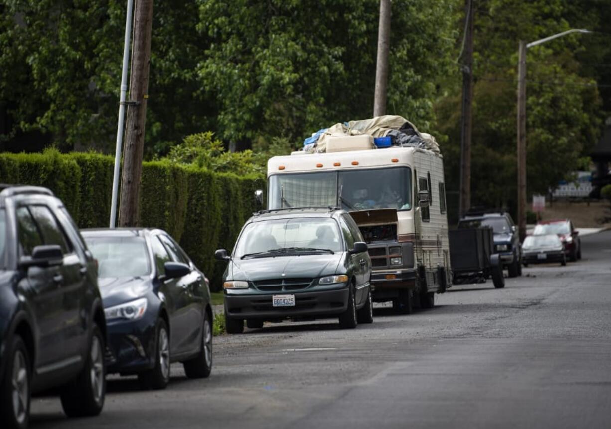 An RV is parked outside the entrance of the Hazel Dell RV Park in Vancouver on June 6. The sight of such vehicles often prompts complaints to county officials.