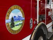 Fire District 3 trucks are parked in the garage at Station 35 in Battle Ground. The city is discussing annexing into the district instead of just contracting with the district, which can only be approved through a public vote. The change would mean a new fire levy for city residents, although could result in savings elsewhere for taxpayers.