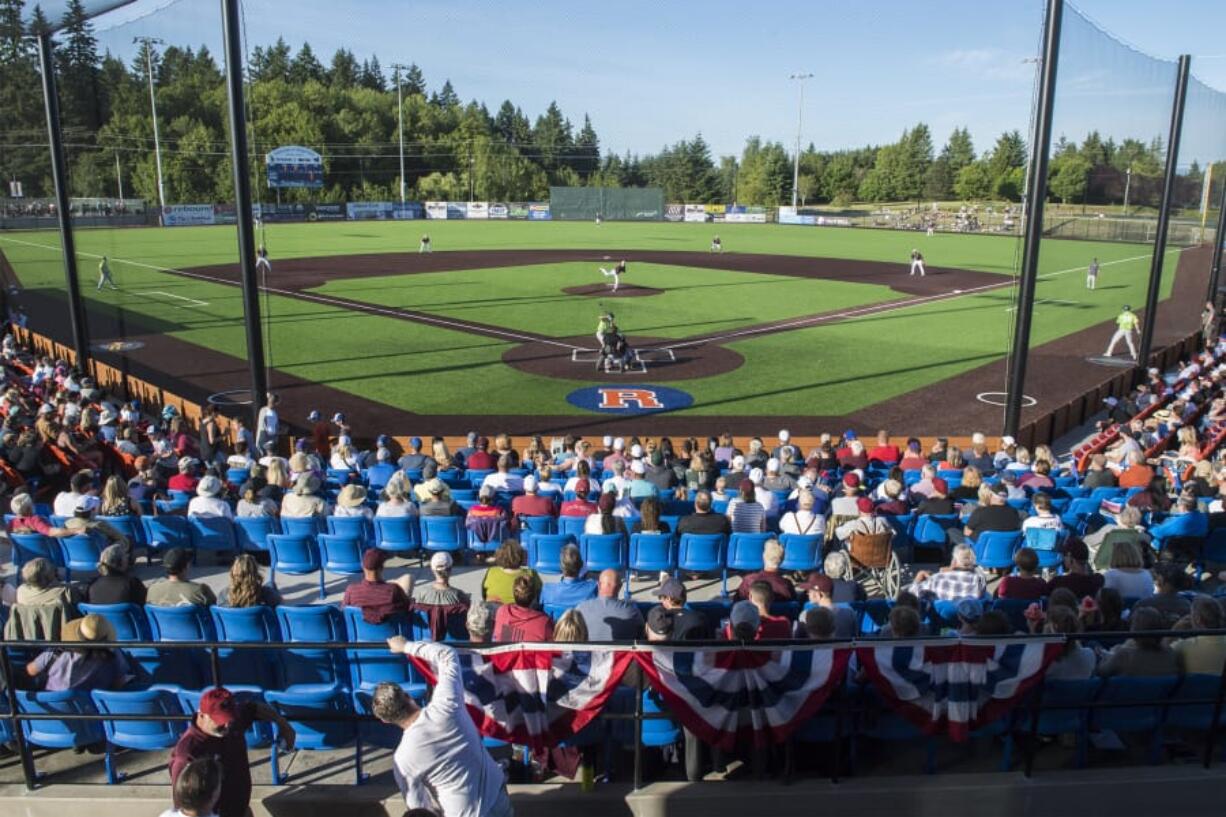 Fans watch the opening innings of the Ridgefield Raptors first ever home game Tuesday night at the new Ridgefield Outdoor Recreation Complex.