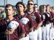 The Raptors line up prior to the their game against Yakima at the Ridgefield Outdoor Recreation Center on Tuesday night, June 4, 2019.