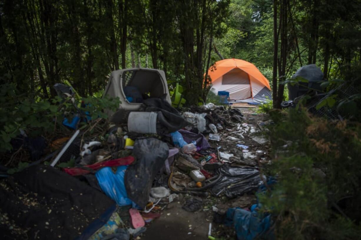 As the county’s homeless population increases, some camp in unincorporated areas such as this wooded spot in Hazel Dell.