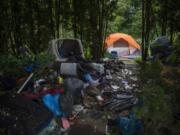 As the county’s homeless population increases, some camp in unincorporated areas such as this wooded spot in Hazel Dell.