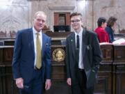 Battle Ground: Rep. Paul Harris, R-Vancouver, left with River HomeLink home school student Sam Weston, who served as a page for Harris.