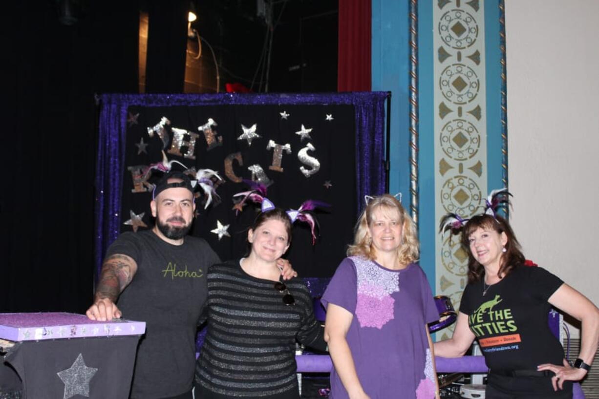 Minnehaha: Furry Friends volunteers, from left, Mike and Jenn Morris, Pam Petitt and Diane Stevens at an Acro-Cats show last month in Portland. They volunteered at the show and were presented with a check for $1,562 for their help with the shows.