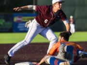 Ridgefield's Cameron Repetti lands a tag on a Port Angeles baserunner Lefties at the Ridgefield Outdoor Recreation Complex on Friday night, June 14, 2019.