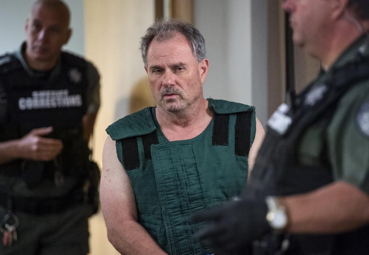 Robert W. Burdick, 56, appears June 19 in Clark County Superior Court, facing an allegation of first-degree domestic violence murder in the stabbing death of his wife, 49-year-old Linda Burdick.