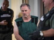 Robert W. Burdick, 56, appears June 19 in Clark County Superior Court, facing an allegation of first-degree domestic violence murder in the stabbing death of his wife, 49-year-old Linda Burdick.