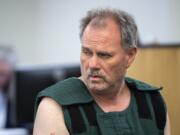 Robert W. Burdick, 56, appears in Clark County Superior Court, facing an allegation of first-degree murder on Wednesday, June 19, 2019. Burdick called 911 at 2:05 a.m. Tuesday from an apartment complex in the 600 block of West Lookout Ridge Drive. He said he was armed with butcher knives and was holding his wife hostage in their home, according to a Washougal Police Department news release. Linda Burdick 49, died later at PeaceHealth Southwest Medical Center in Vancouver after undergoing emergency surgery for multiple stab wounds to the upper body.