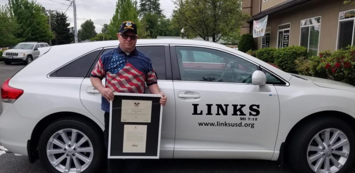 George Golden of Vancouver won the President’s Volunteer Service Award for his work feeding the hungry and buying school supplies for children.