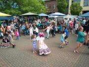 Dancers and vendors enjoy the inaugural Southwest Washington Tamale Festival in Washougal last June. This year, organizers have planned a day that’s stuffed with music, dance — and “plenty of tamales for everyone,” Hector Hinojosa said.