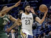 The New Orleans Pelicans have agreed to trade Anthony Davis (23) to the Los Angeles Lakers for point guard Lonzo Ball, forward Brandon Ingram, shooting guard Josh Hart and three first-round draft choices. The people spoke to The Associated Press on Saturday, June 15, 2019, on condition of anonymity because the trade cannot become official until the new league year begins July 6.