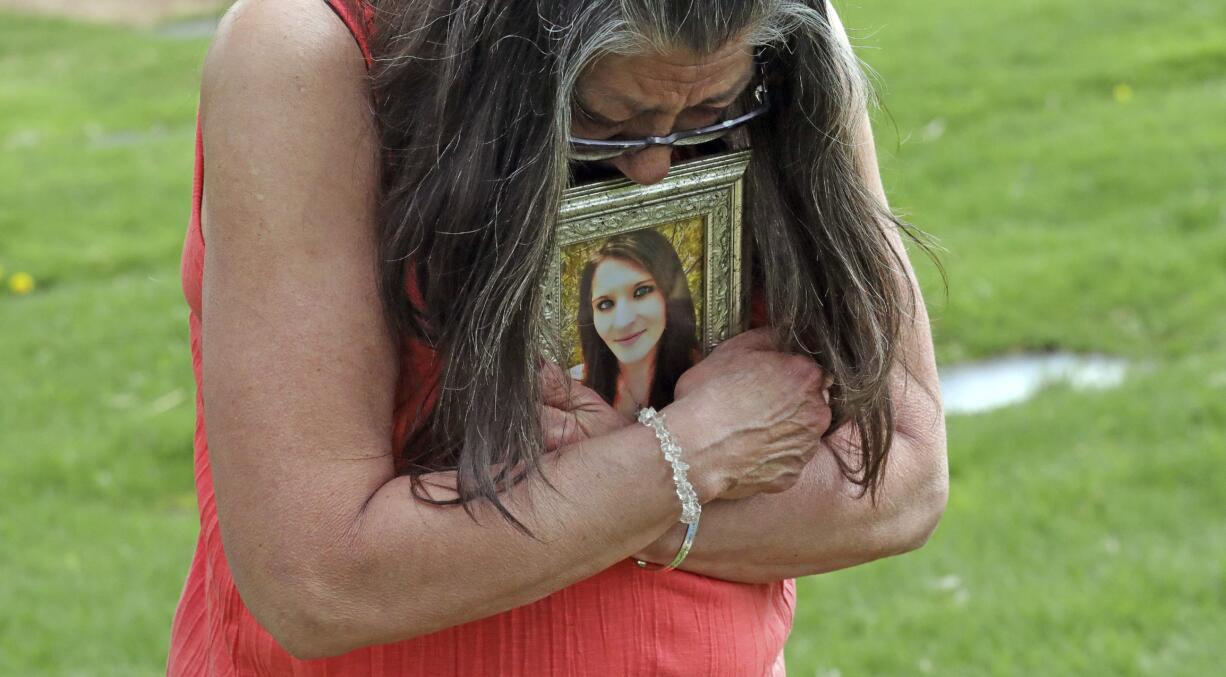 Melany Zoumadakis clutches a photo of her daughter, Tanna Jo Fillmore, on Friday, April 26, 2019, in Salt Lake City. Fillmore killed herself in the Duchesne County Jail in 2016, after repeatedly calling her mother, saying she was being denied her prescription medicines that had stabilized her. Her mother has filed suit.