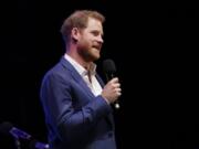 Britain’s Prince Harry speaks on stage during a concert hosted by his charity Sentebale at Hampton Court Palace, in London, Tuesday June 11, 2019. The concert will raise funds and awareness for Sentebale, the charity founded by Prince Harry and Lesotho’s Prince Seeiso in 2006, to support children and young people affected by HIV and AIDS in Lesotho, Botswana and Malawi.