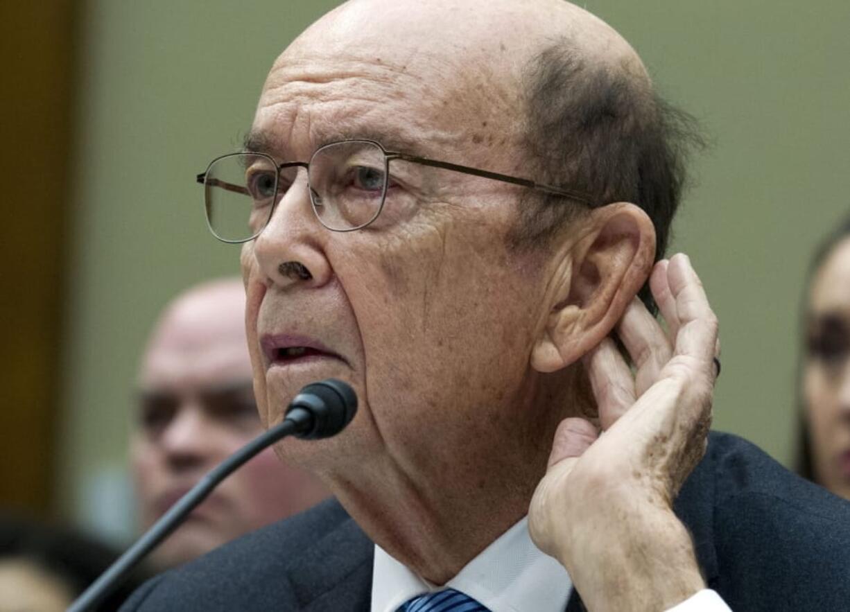 FILE - In this March 14, 2019 file photo Commerce Secretary Wilbur Ross testifies during the House Oversight Committee hearing on Capitol Hill in Washington. New evidence paints a “disturbing picture” that racial discrimination may be the motive behind the Trump administration’s push to ask everyone in the country about citizenship status, a federal judge wrote in a filing, Monday, June 24, 2019. In his court filing, U.S. District Judge George Hazel of Maryland reasoned that new evidence “potentially connects the dots between a discriminatory purpose” and a decision by Commerce Secretary Wilbur Ross to add the citizenship question.