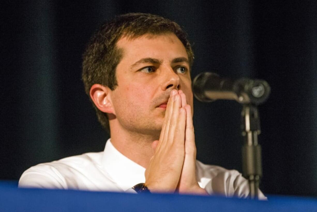 Democratic presidential candidate and South Bend Mayor Pete Buttigieg looks on during a town hall community meeting, Sunday, June 23, 2019, at Washington High School in South Bend, Ind. Buttigieg faced criticism from angry black residents at the emotional town hall meeting, a week after a white police officer fatally shot a black man in the city.