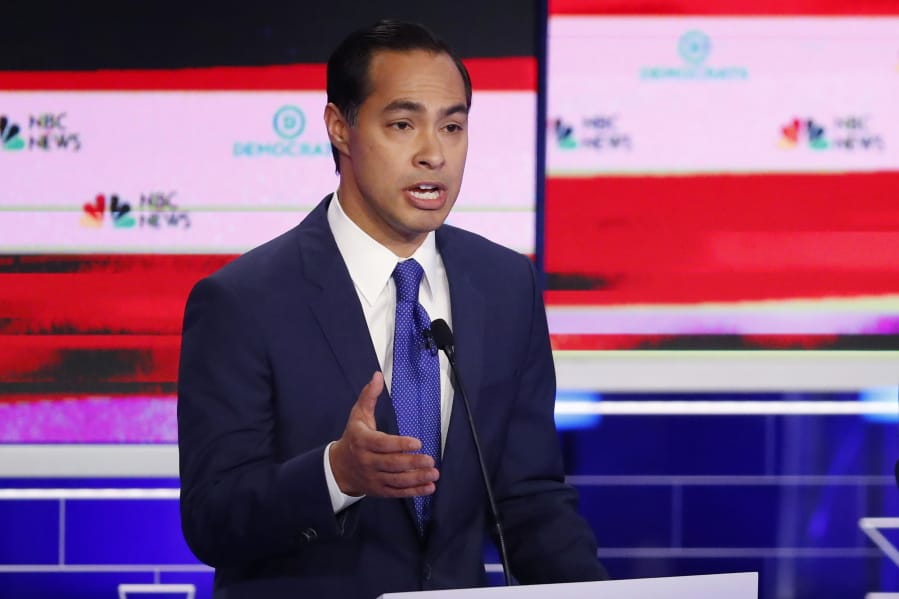 Democratic presidential candidate former Housing and Urban Development Secretary Julian Castro gestures during a Democratic primary debate hosted by NBC News at the Adrienne Arsht Center for the Performing Arts, Wednesday, June 26, 2019, in Miami.