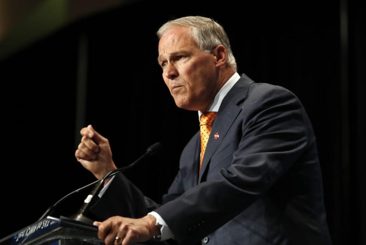 Democratic presidential candidate Washington Gov. Jay Inslee speaks during the Iowa Democratic Party’s Hall of Fame Celebration, Sunday in Cedar Rapids, Iowa.