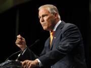 Democratic presidential candidate Washington Gov. Jay Inslee speaks during the Iowa Democratic Party’s Hall of Fame Celebration, Sunday in Cedar Rapids, Iowa.