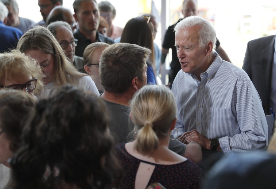 Democratic presidential candidate former Vice President Joe Biden greets supporters after a town hall meeting, Tuesday, June 11, 2019, in Ottumwa, Iowa.