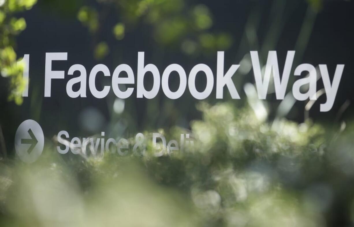 FILE - In this April 25, 2019, file photo an address sign for Facebook Way is shown in Menlo Park, Calif. Facebook unveiled a broad plan Tuesday, June 18, to create a new digital currency.