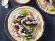 Grilled Lamb Kofte with Yogurt Sauce (Carl Tremblay/America’s Test Kitchen via AP)