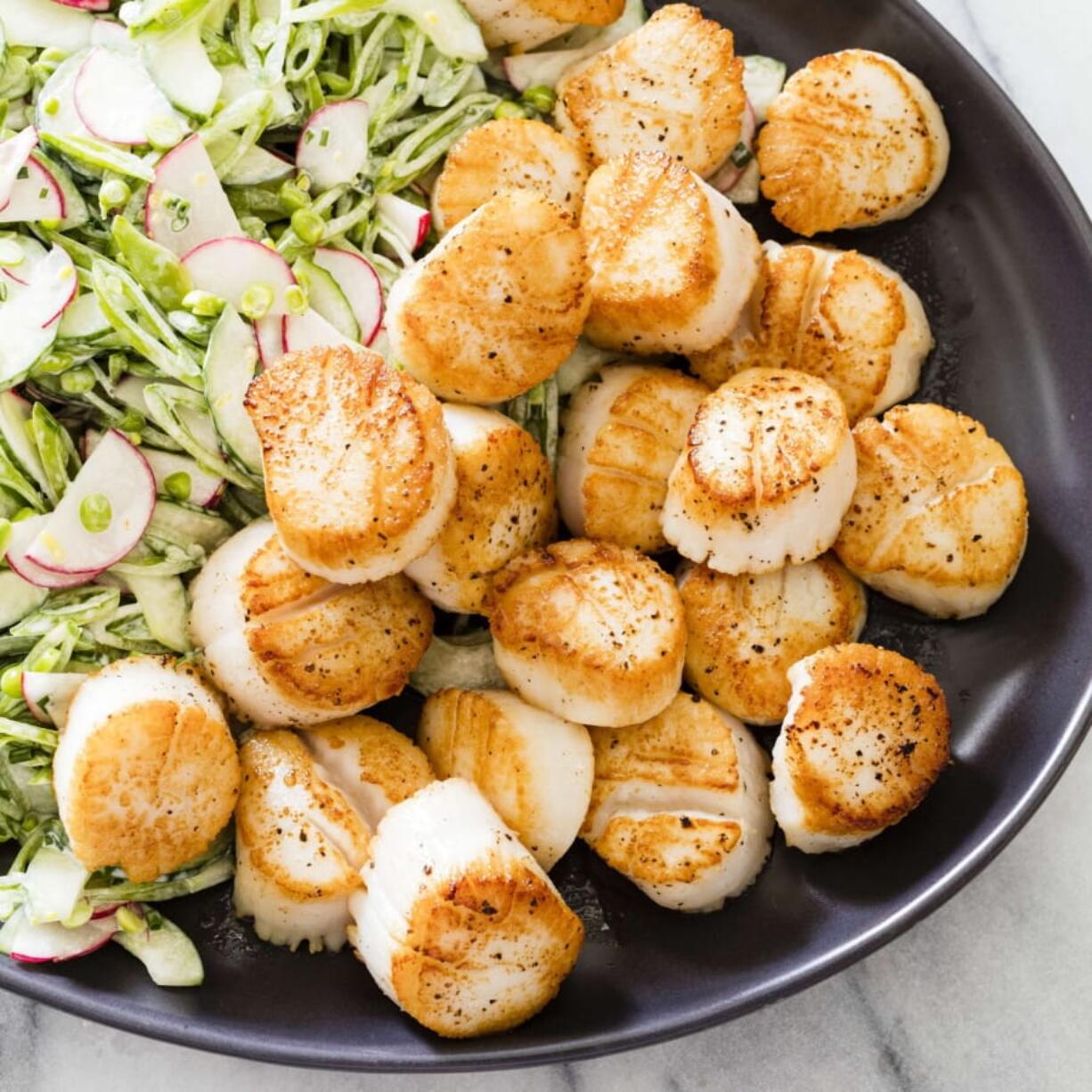 Pan-Seared Scallops With Super Snap Pea Slaw from the cookbook “Vegetables Illustrated.” Daniel J.