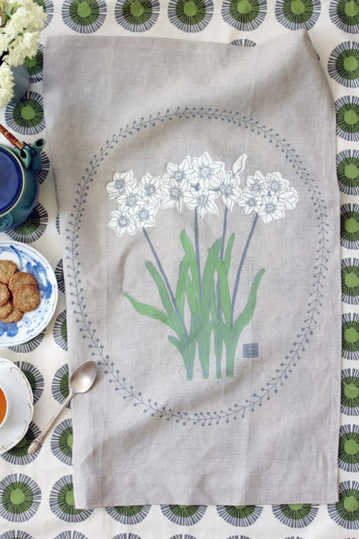 A Paperwhites tea towel, three-color screenprint on linen designed by Jen Hewett.