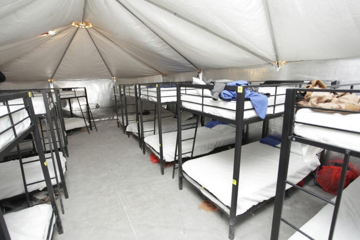 FILE - This undated photo released by U.S. Department of Health and Human Services shows inside of the HHS’ facility at Tornillo, Texas. On Friday, June 28, 2019, border officials were expected to unveil the newest outdoor facility meant to detain immigrant children and families who cross the U.S. border near Yuma, Ariz. Over the last two years, that area has seen a tremendous spike in the number of families and children who travel unaccompanied. (U.S.