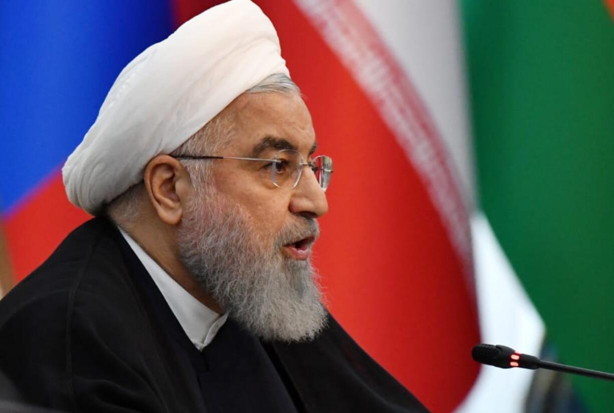 Iranian President Hassan Rouhani speaks during a session of the Shanghai Cooperation Organization summit in Bishkek, Kyrgyzstan, Friday, June 14, 2019. The Shanghai Cooperation Organization is a security alliance that brings together Russia, China, India, Pakistan along with ex-Soviet Central Asia nations of Kazakhstan, Kyrgyzstan, Tajikistan and Uzbekistan.