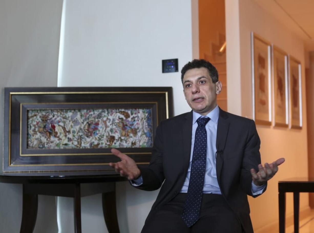 Nizar Zakka, a Lebanese citizen and permanent U.S. resident who was released in Tehran after nearly four years in jail on charges of spying, speaks during an interview with The Associated Press at a hotel in Dbayeh, north of Beirut, Lebanon, Wednesday, June 12, 2019. Zakka, an information technology expert, who was detained in Iran in September 2015 while trying to fly out of Tehran called on President Donald Trump to “get back your hostages” from Iran. He was sentenced to 10 years in prison after authorities accused him of being an American spy - allegations vigorously rejected by Zakka, his family and associates.