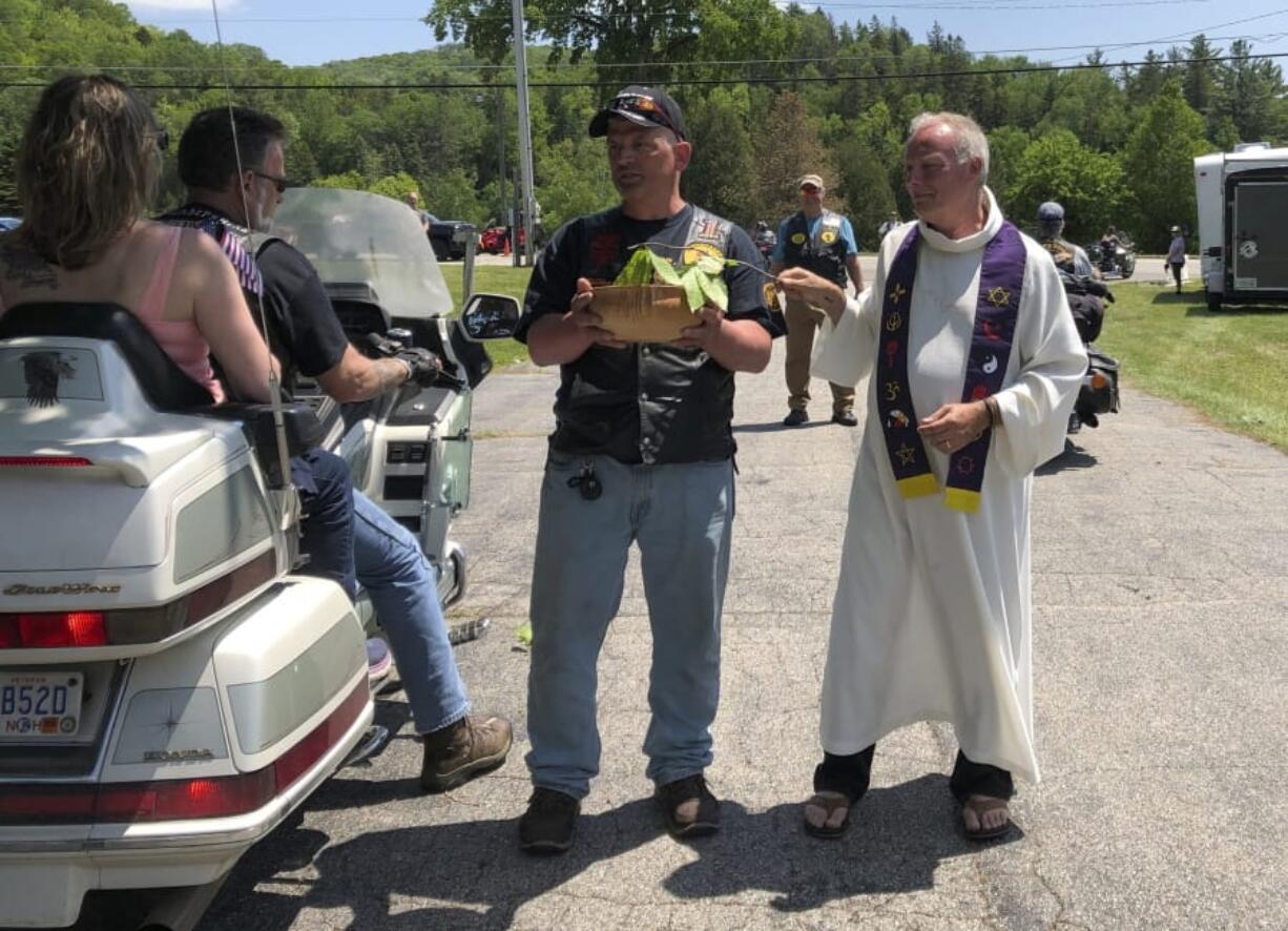 Motorcyclists participate in a Blessing of the Bikes ceremony on Sunday in Columbia, N.H. Bikers are reeling from a crash in which a pickup truck collided with a group of 10 motorcycles Friday evening.