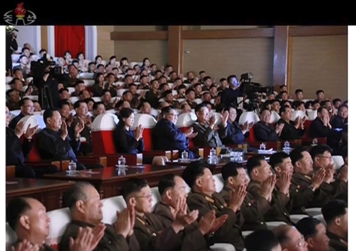 This image made from video of a still image broadcasted Monday, June 3, 2019, by North Korea’s KRT shows senior North Korean official Kim Yong Chol, second from right, and a clapping Kim Jong Un, center, sitting in the same row along with other top officials during a musical performance by the wives of Korean People’s Army officers Sunday, June 2, 2019. The senior North Korean official who had been reported as purged over the failed nuclear summit with Washington was shown in state media on Monday enjoying a concert near leader Kim.