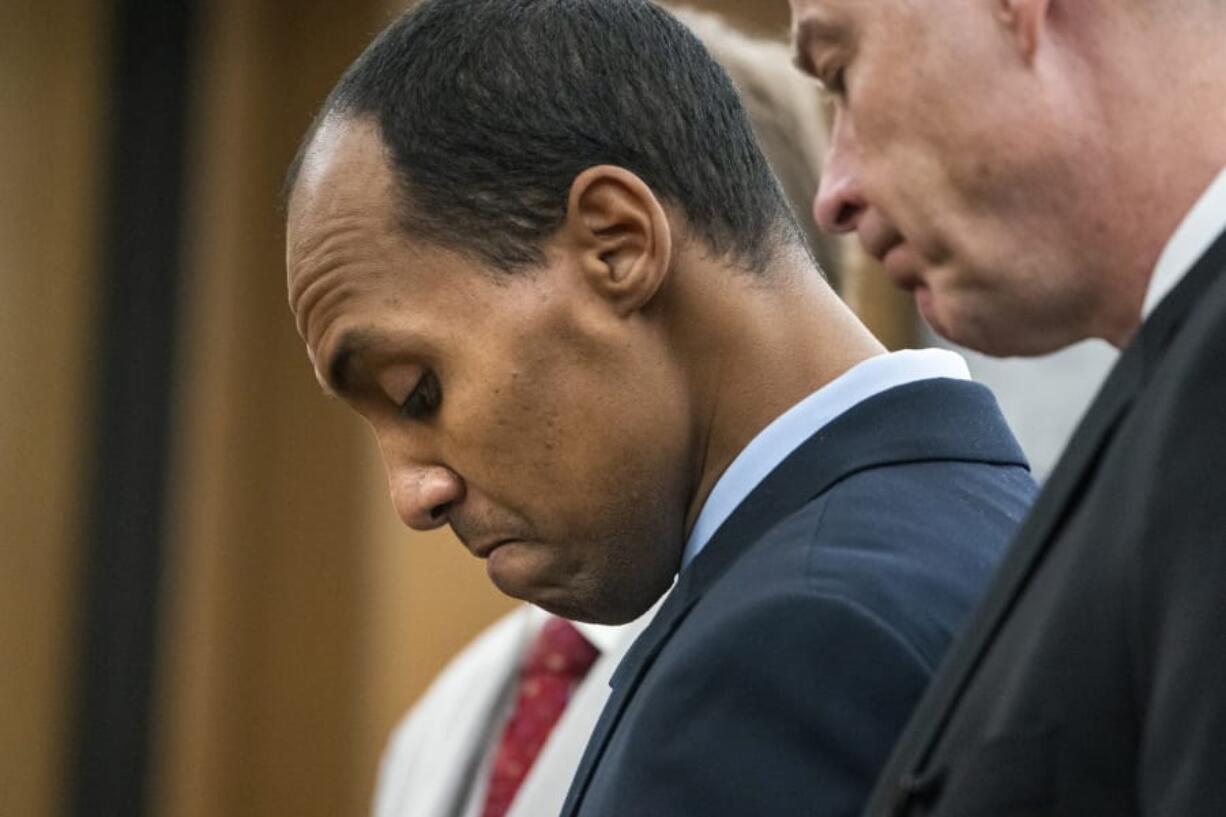 Former Minneapolis police officer Mohamed Noor reads a statement Friday, June 7, 2019, in Minneapolis, before being sentenced by Judge Kathryn Quaintance in the fatal shooting of Justine Ruszczyk Damond. Noor, convicted of shooting an unarmed woman to death as she walked toward his cruiser says he can’t apologize enough “for taking the life of a perfect person. He sentenced Friday to 121/2 years in prison for the shooting.