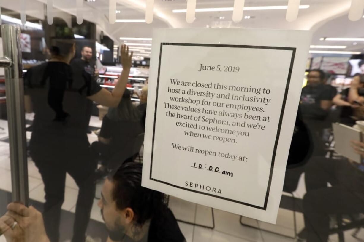 Sephora employees gather on Wednesday in one of the company’s closed stores in New York.