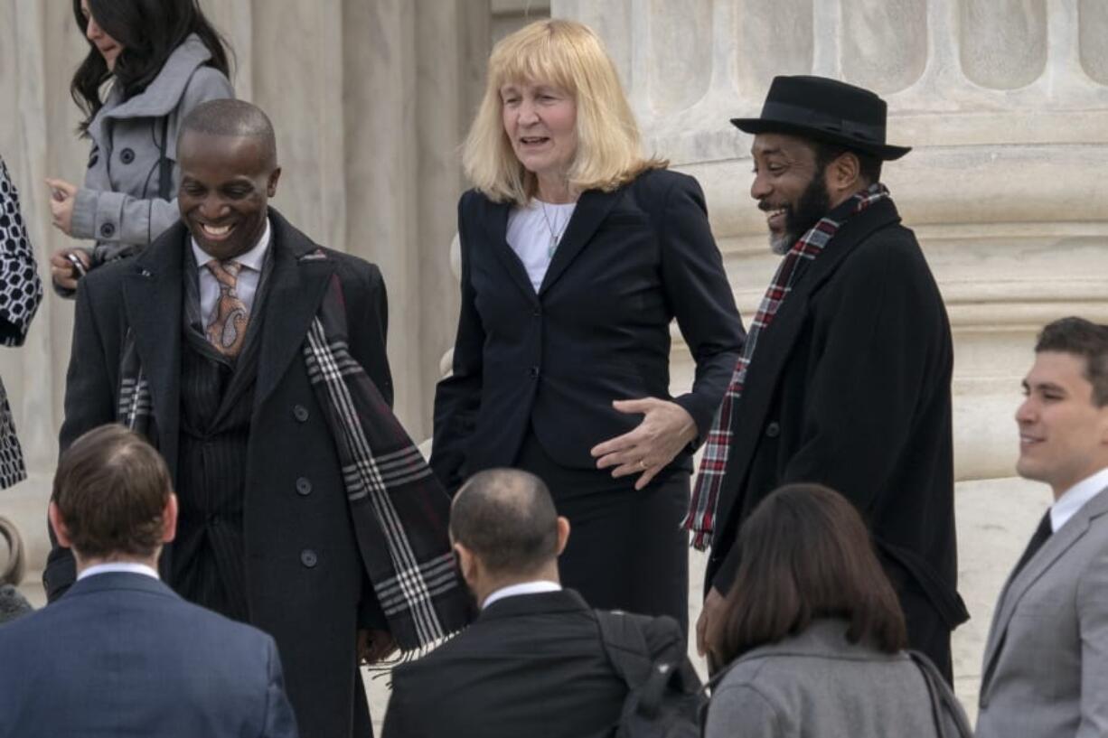 FILE - In this March 20, 2019 file photo, Attorney Sheri Johnson leaves the Supreme Court after challenging a Mississippi prosecutor’s decision to keep African-Americans off the jury in the trial of Curtis Flowers, in Washington. The Supreme Court is throwing out the murder conviction and death sentence for Flowers because of a prosecutor’s efforts to keep African Americans off the jury. The defendant already has been tried six times and now could face a seventh trial. The court’s 7-2 decision Friday says the removal of black prospective jurors violated the rights of inmate Curtis Flowers. (AP Photo/J.