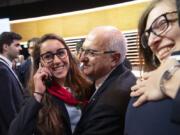 Italian skier Sofia Goggia celebrates with members of the Italian delegation after International Olympic Committee (IOC) president Thomas Bach from Germany announced that Milan-Cortina has won the bid to host the 2026 Winter Olympic Games, during the first day of the 134th Session of the International Olympic Committee (IOC), at the SwissTech Convention Centre, in Lausanne, Switzerland, Monday, June 24, 2019. Italy will host the 2026 Olympics in Milan and Cortina d’Ampezzo, taking the Winter Games to the Alpine country for the second time in 20 years.