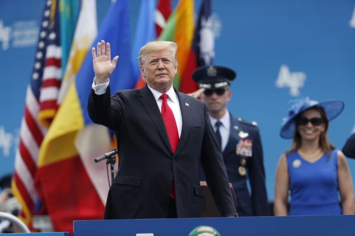 President Donald Trump waves as he takes the stage to speak at the U.S. Air Force Academy graduation Thursday, May 30, 2019 at Air Force Academy, Colo.