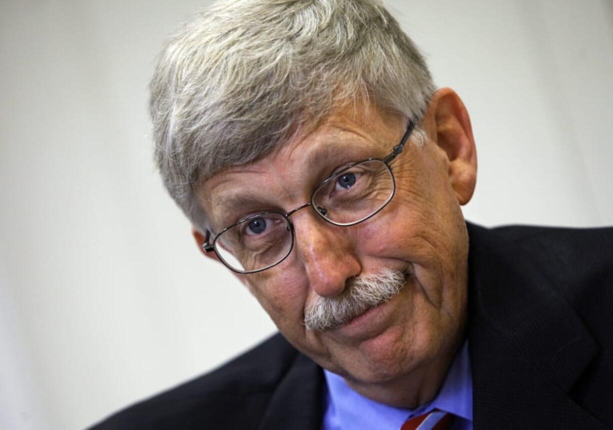 FILE - In this Aug. 17, 2009 file photo, Dr. Francis Collins, director of the National Institutes of Health,, is seen at NIH headquarters in Bethesda, Md. T (AP Photo/J.