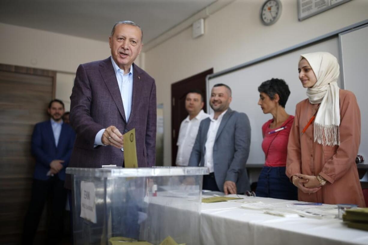 Turkey’s President Recep Tayyip Erdogan casts his ballot at a polling station in Istanbul, Sunday, June 23, 2019. Polls have opened in a repeat election in Turkey’s largest city where Erdogan and his political allies could lose control of Istanbul’s administration for the first time in 25 years.