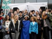 Young plaintiffs stand on the steps of the United States District Courthouse during a rally Oct. 29 in Eugene, Ore., to support a high-profile climate change lawsuit against the federal government. A lawsuit by a group of young Americans accusing the U.S. government of harming them by having fostered a fossil-fuels energy system faces a major hurdle Tuesday when a federal appeals court hears oral arguments on whether the case should proceed.