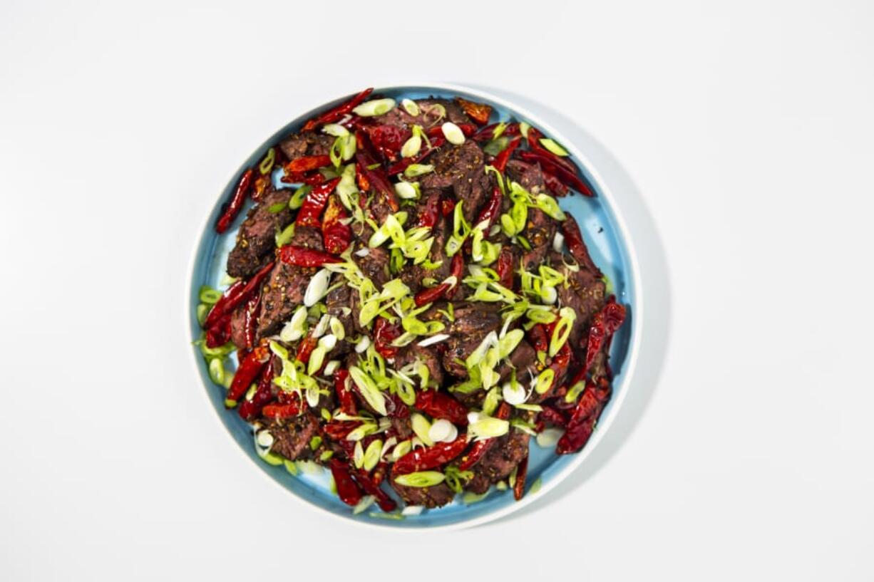 Prime hangar steak with Szechuan spices and citrus, from chef Brandon Kida, at Hinoki & the Bird, in Century City, photographed on a Los Angeles, Calif., rooftop, June 13, 2019. (Jay L.