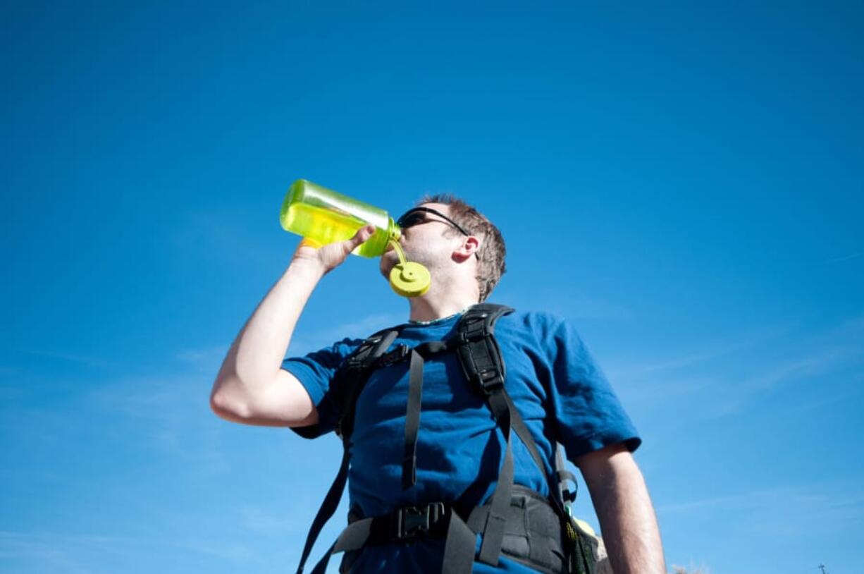 Take hydration seriously when hiking in summer.