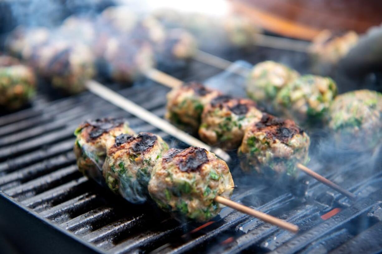 Meatballs cook through quickly on the grill and develop a smoky taste.