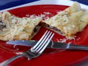 French crepe filled with mushrooms, shallots and cheese. Hillary Levin/St.