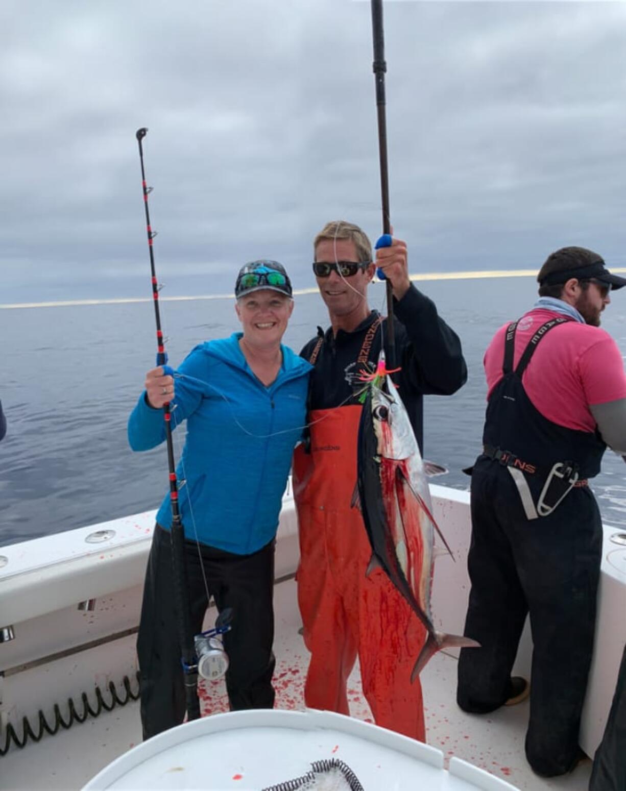 A happy angler proudly displayes the first tuna of the year for Shake and Bake Tuna Charters of Ilwaco, WA. The schools of albacore are finally within range of the Washington Coast.