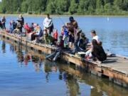 Kids and parents enjoy the first annual Kids Fishing Derby held at Streeter's Resort along the banks of Silver Lake this last Saturday. 35 kids took part, catching over 40 panfish.