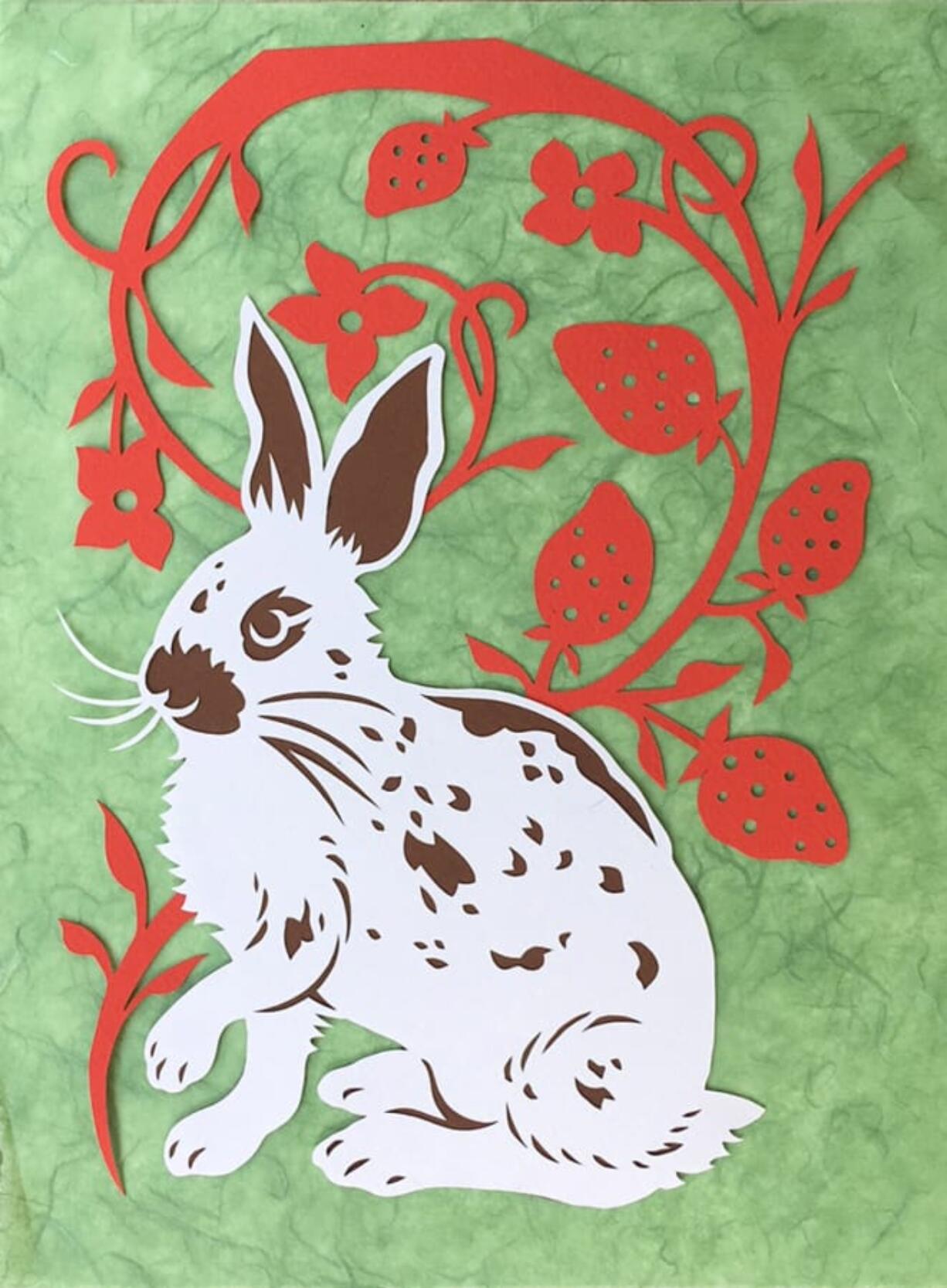 See “Bunny,” an intricate papercut by Muriel Wheatley and Levi Greenacres of Lovebirds Paper. Their exhibit, “Animalibris,” will be on display at the Second Story Gallery in the Camas Library during the month of July.